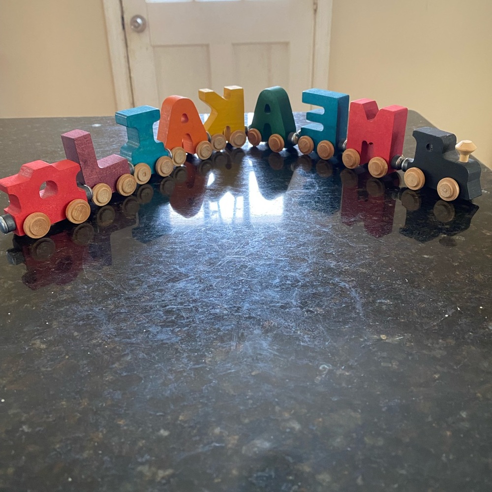 Wooden magnetic name trains
